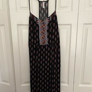 Long maxi dress with adjustable straps.